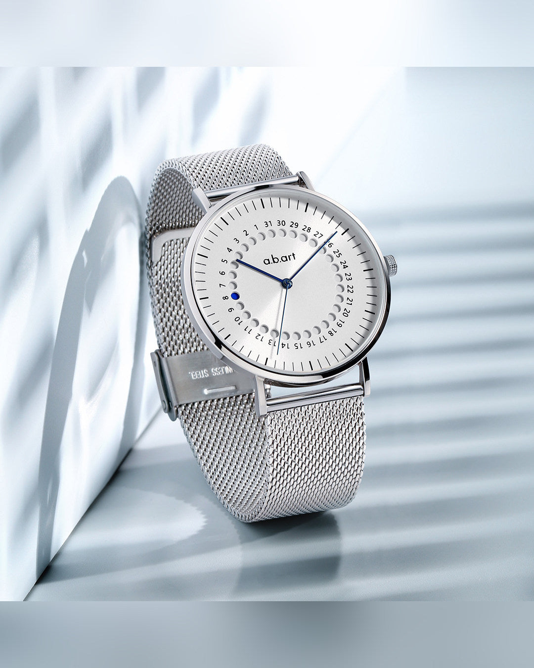 Silver dial · Blue hands